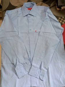 LIGHT BLUE FULL SLEEVE L SIZE SHIRT GENTLY USED.