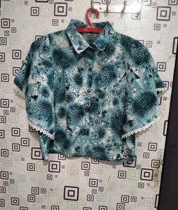 Stylish Blue Printed Top with Lace Detail
