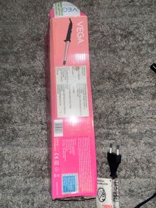 Vega I-Curl hair curler with a 0.5-1 inch tapered