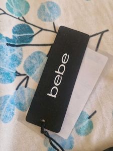 Bebe off shoulder party top(new with tags)