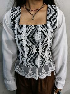 White top with black pattern