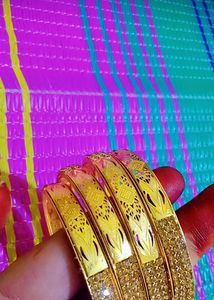 Set of Gold Bangle Bracelets
