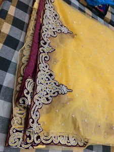 Stunning net Yellow Embroidered Saree