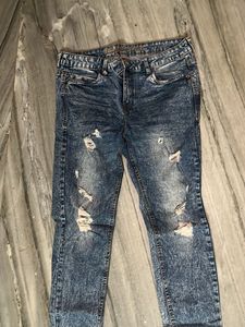 Distressed Blue Denim Jeans
