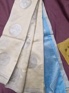 Elegant Cream Saree with Silver Motifs.new one