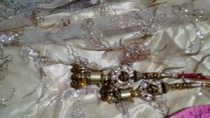 The maroon  lehenga   with golden colour net gown