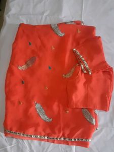 Orange Saree with Silver Embroidery