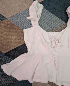 white frill sleeveless top