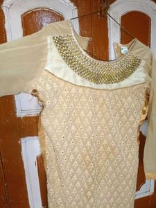 Elegant Beige Kurta with Embellished Neckline