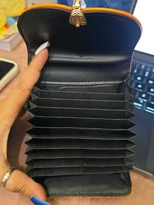 Orange Textured Wallet with Snake Clasp