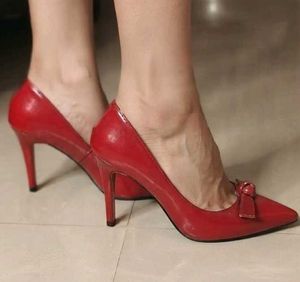 Chic Red Stiletto Heels with Bow Detail