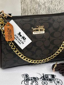 But 1 get one free Coach monogram shoulder bag