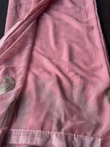 Elegant Pink Saree with Peacock Design