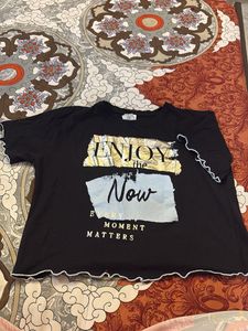 Black T-Shirt with "Enjoy the Now"
