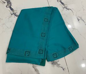 Elegant Teal saare nd blouse with Embellishments