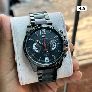 Tommy Hilfiger • Dial: Blue with chronograph-style