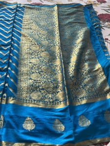 Vibrant Blue Saree with Gold Zigzag Pattern