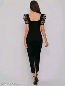 Elegant Black Dress with Polka Dot Sleeves