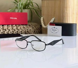 Prada Gold Frame Eyeglasses
