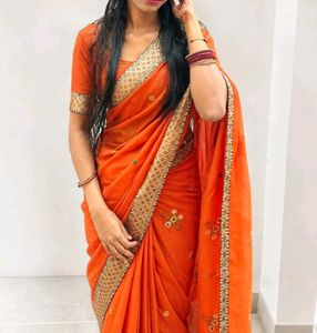 Beautiful Orange Saree with Golden Border