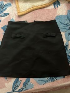 Black Mini Skirt with Bow Detail