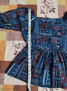 Patterned Peplum Top