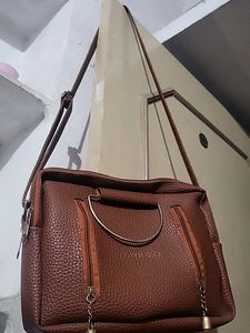 Sling Bag In Dark Brown Color Not Used New Item Very Spacious Have Multiple Sections