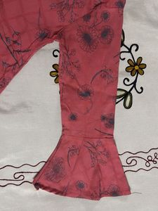 Peach peplum top