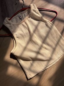 Pair Of White And Black Tank Tops