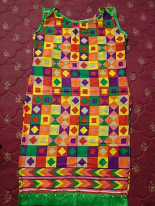 Multi Coloured Cotton Kurti With Pearls Attached On The Neck And Bottom Part.