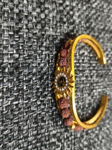 Elegant Gold  polish and Rudraksha Bracelet