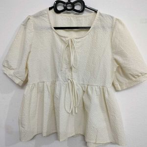 Cream Textured Peplum Top