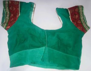 Elegant Teal Saree with Intricate Embellishments