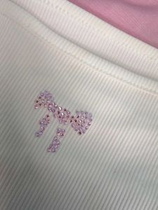 Off-Shoulder White Top with Bow Detail