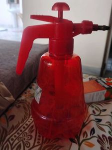 Red Spray Bottle for cleaning windows