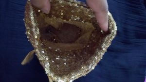 Golden sequined potli