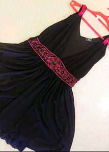 Black Mini Dress with Pink Embellishments