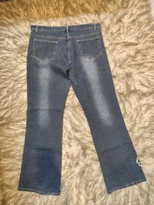Whimsical Floral Embroidered Denim Jeans