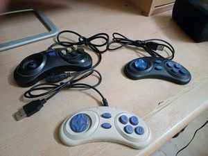3 video game remote and 8 in 1 Cassettes