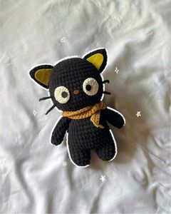 black cat cuddle plushie