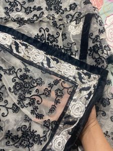 White net saree with black velvet design
