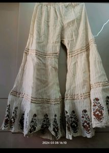 cream colour gharara and top with dupatta