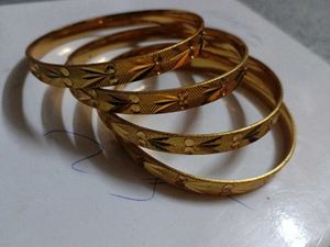 Elegant Gold Tone Bangles