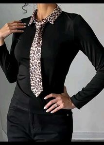a black long-sleeved top or blouse