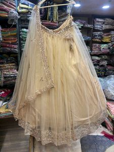 Amazing golden Peplum long Front Cut Lehga