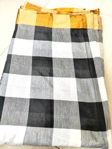 black and white chex zari border semi silk saree