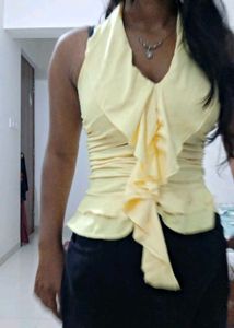 Yellow Ruffle Front Sleeveless Top