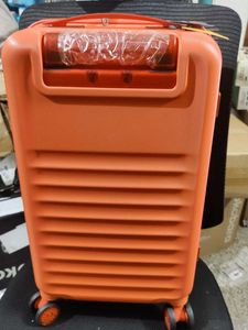 Mokobara Orange Hardshell aisle trunk Suitcase