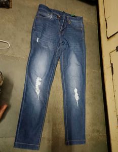 Distressed Blue Denim Jeans