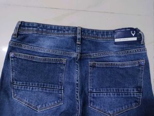 Ripped Dark Wash Denim Jeans